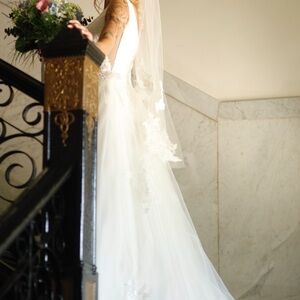 Stunning Ivory Bridal Gown with Lace Details